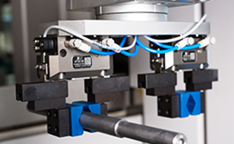 卧式搓齿机+割槽机+桁架式机器人