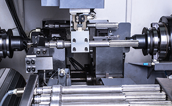 铣端面钻中心孔机床+桁架式机器人